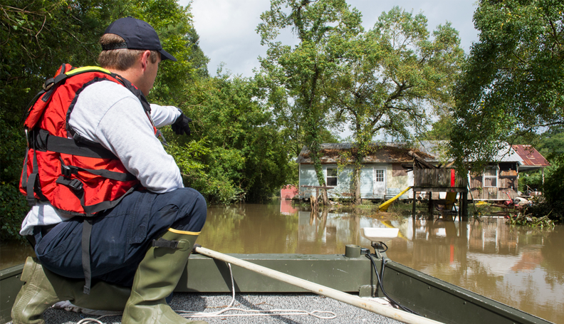 Regional Response Team Six conduct search and rescue operations by boat in Ascension Parish. (Photo by J.T. Blatty/FEMA)