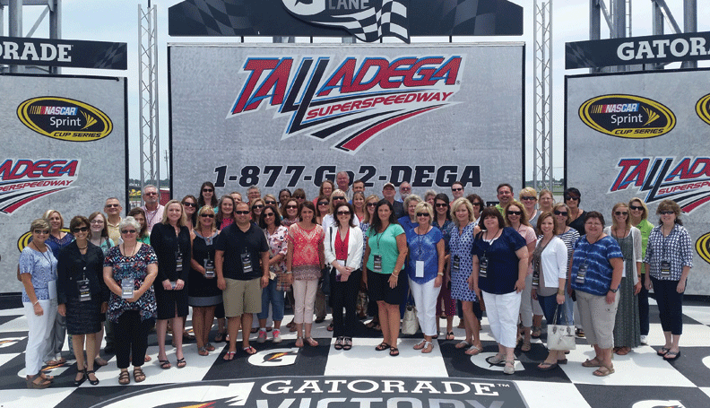 More than 50 teachers learn about tourism's impact on Alabama's economy during a workshop at the Talladega Superspeedway as part of the Atlanta Fed's 