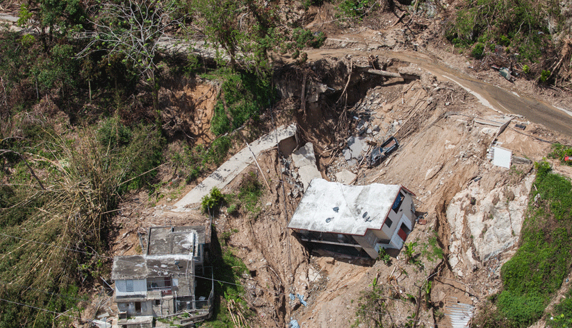 Aerial view of destroyed homes in the mountainous area of Utuabo, Puerto Rico. After Hurricane Maria, many homes, businesses, roads, bridges, and government buildings suffered major damage resulting from strong winds and heavy rain. Photo by Andrea Booher, courtesy of the Federal Emergency Management Agency