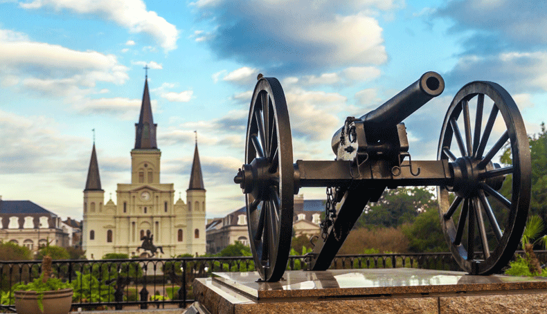 Downtown New Orleans's Washington Artillery Park, with St. Louis Cathedral in the background