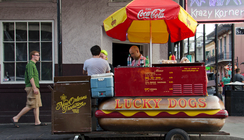 A vendor selling Lucky Dogs, a New Orleans stalwart
