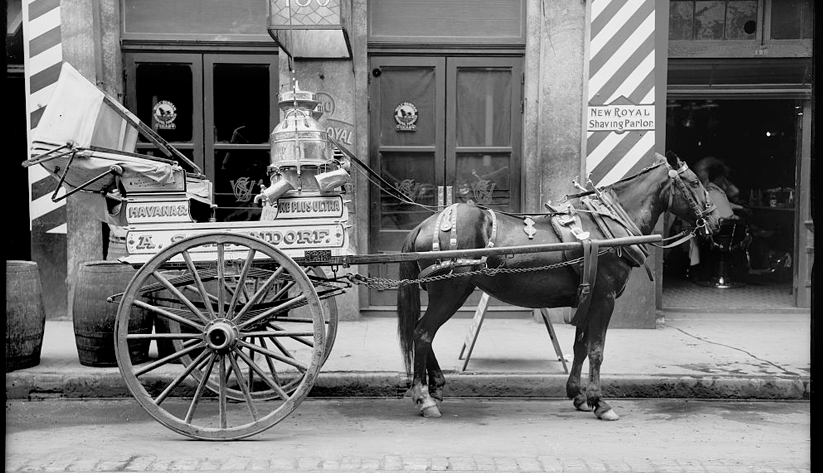 A milk cart in front of a barbershop in New Orleans, ca. 1900–10. Photo courtesy of the Library of Congress photographic archives