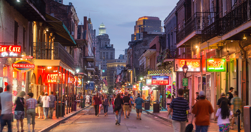photo of New Orleans' Bourbon Street at nightfall