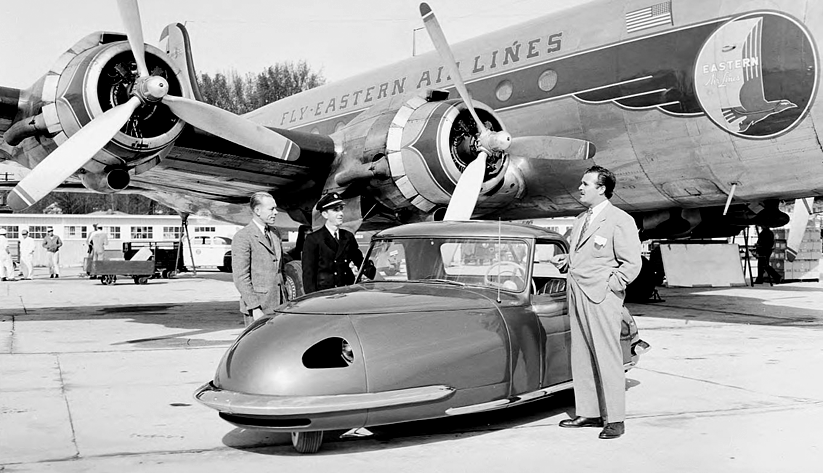 With an Eastern Air Lines plane in the background, a three-wheel automobile on the tarmac at Atlanta Municipal Airport, 1948. Photo courtesy the Special Collections and Archives, Georgia State University Library